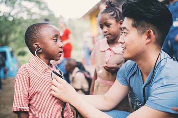 Endodontist Timothy Kim Doing Outreach Work With Children